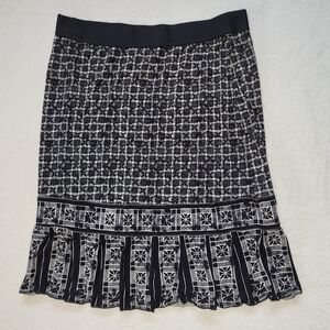 Black, White, And Green Geometric Patterned Skirt With Kick Pleated Hem